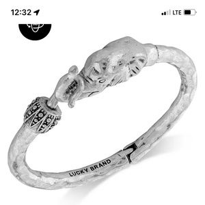 Lucky brand ,silver toned ..elephant bracelet ..some small tarnishing on inside